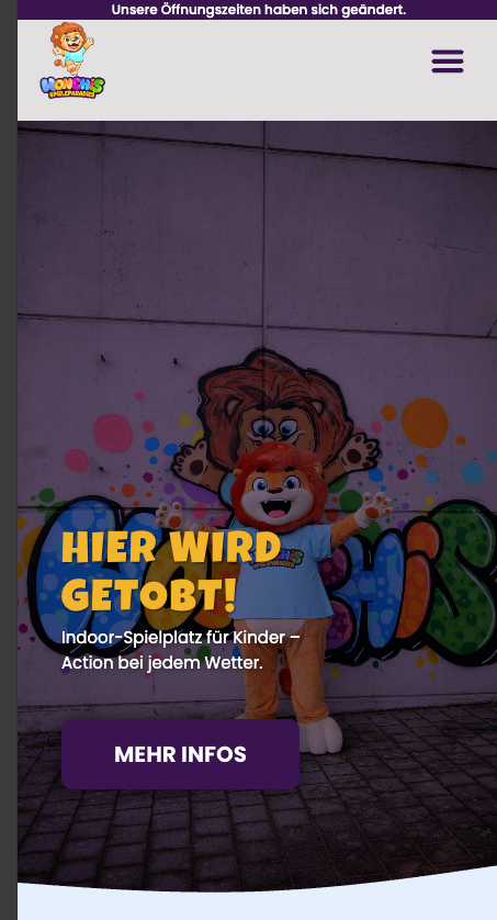 Wonchis Spieleparadies – mobile Startseite mit Löwenmaskottchen und der Überschrift „Hier wird getobt!"